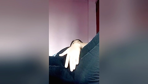 Brunette babe in pink lingerie takes off her clothes