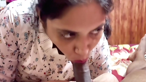 Indian brunette with a hairy pussy stripping in close up