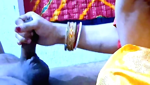 Indian teen in red dress shows blowjob and a handjob