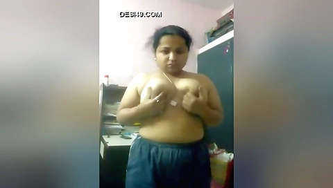 Sexy brunette in lingerie shows her sexy body and pussy