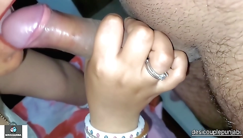 Indian girl is blowing her boyfriend's dick in amateur video