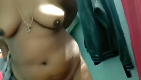 Indian girl in a white towel is playing with her pussy