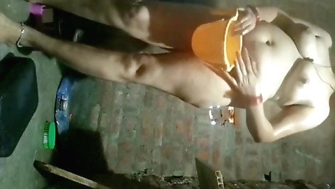 Indian desi aunty bathing and sucking on a big dick