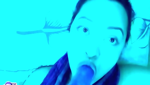 Sexy brunette masturbating with a dildo in a hotel