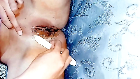 Indian hairy girl strips naked and rubs her hairy pussy