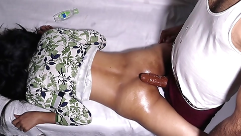 Indian girl in a sexy dress and stockings rides a big dildo