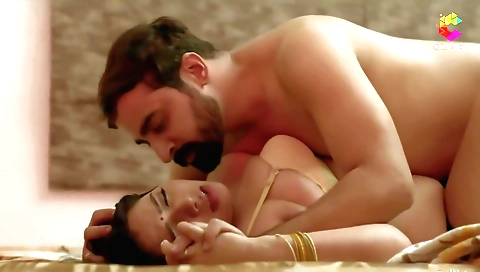 Busty brunette milf in sexy lingerie in a sensual pose