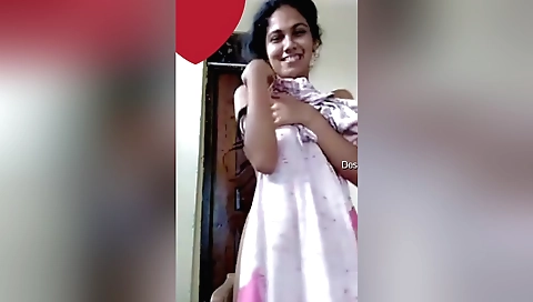 Indian babe filmed on webcam showing her natural tits