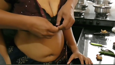 Indian bhabhi in a small kitchen video with a big booty
